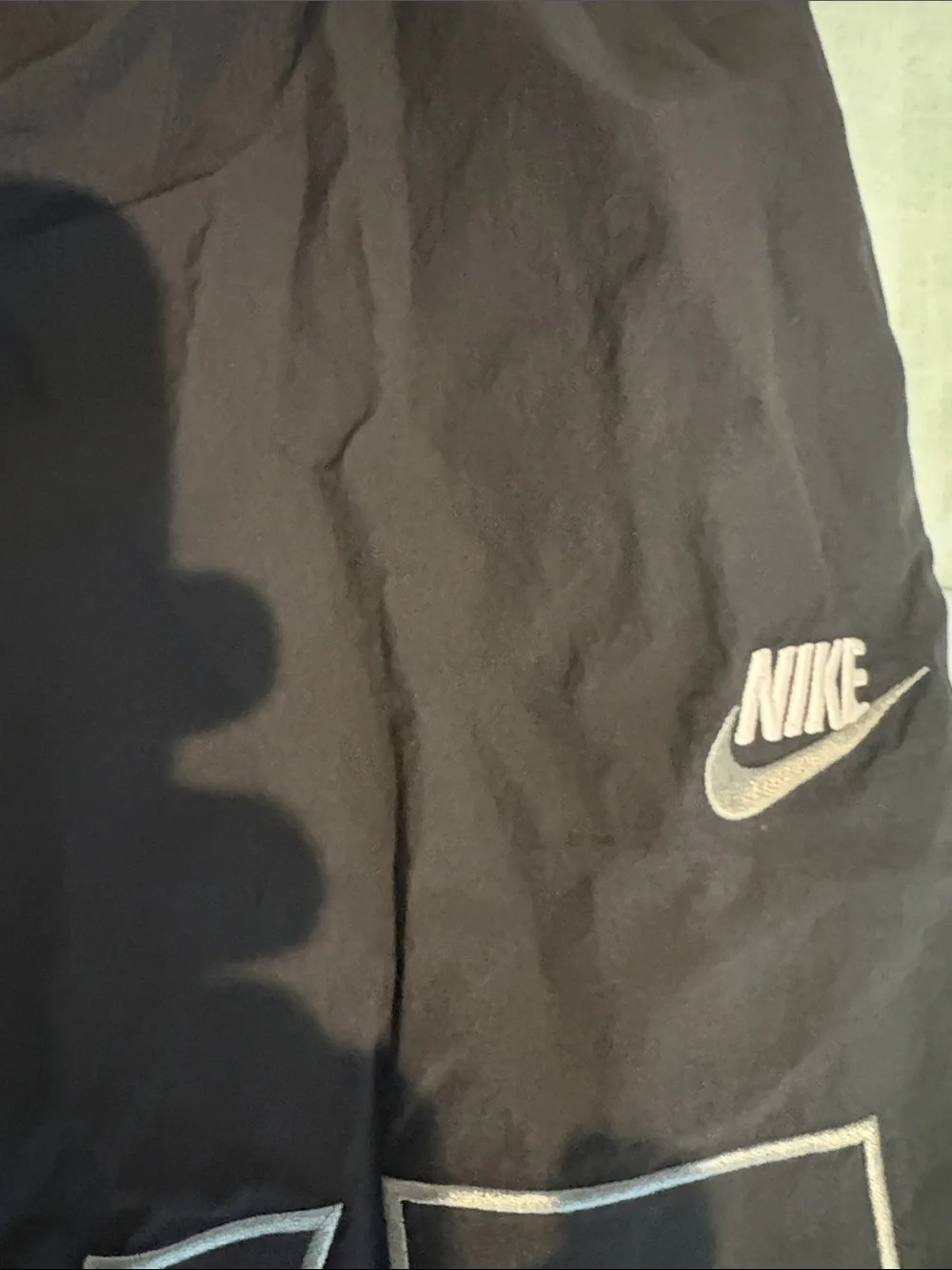 Nike Black Shorts with White Outline NIKE Graphic tapered fit mid thigh medium